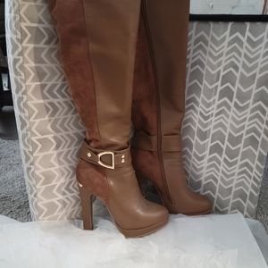 High knee, heeled boots